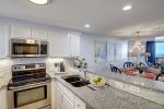 Stainless steel appliances with kitchen amenities